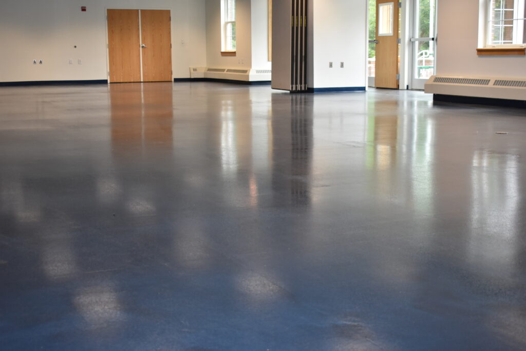 York County Community College Cafeteria Metallic Epoxy Finished Floor Blue Coastal with Matching Blue Vinyl Cove Base
