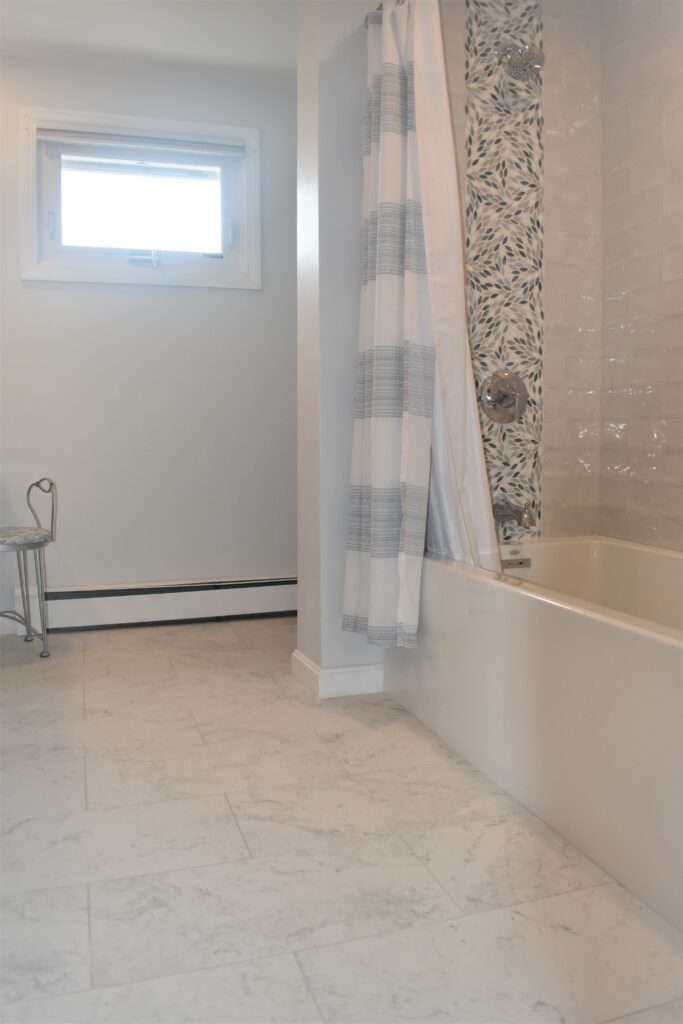 Coastal Home, Bathroom, Master Bath, Tile Custom Shower Surround, Subway, White Linear Tile, Leaves Pattern Mosaic Vertical Decorative Band, Blue and Gray, Marble look Porcelain, Large Format Floor Tile
