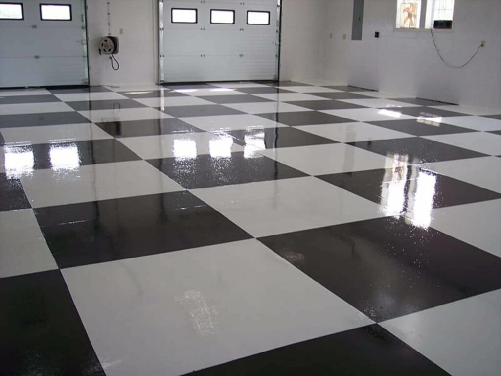 Auto garage with black and white checkered floor